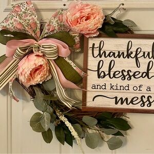 Grapevine wreath with wooden sign, ribbonn bow and peonies and greenery
